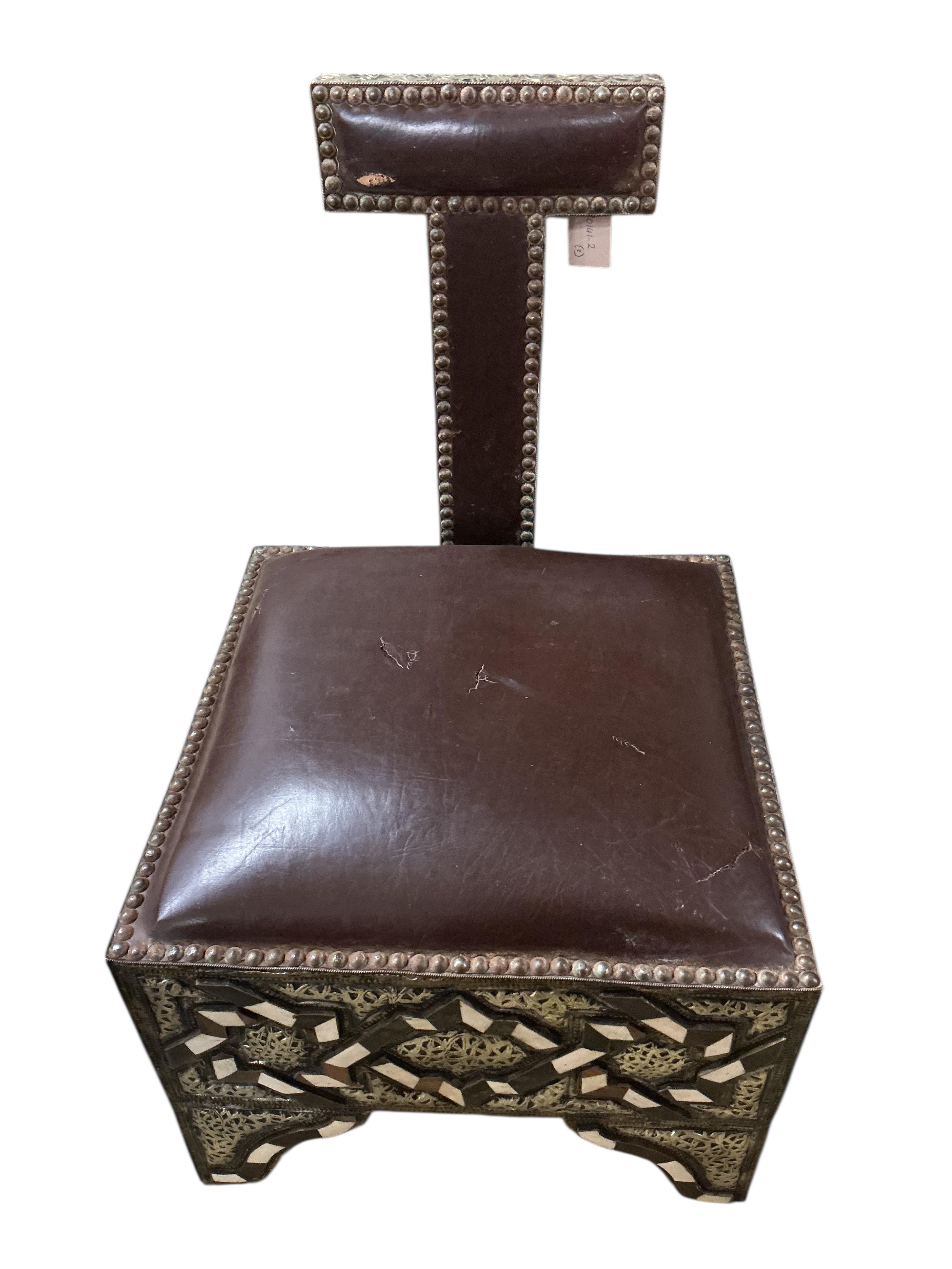 A pair of 20th century Moroccan Berber bone, horn and repousse metal chairs with seats, width 45cm, depth 45cm, height 75cm